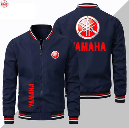 A navy blue Yamaha bomber jacket shown from both the front and back. The jacket features a red and white Yamaha logo on the left chest, red 'YAMAHA' text on the right chest and left sleeve, and red, white, and navy striped ribbed collar, cuffs, and hem.