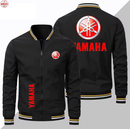 Black Yamaha bomber jacket shown from the front and back, featuring red and white branding and striped ribbed collar, cuffs, and hem.