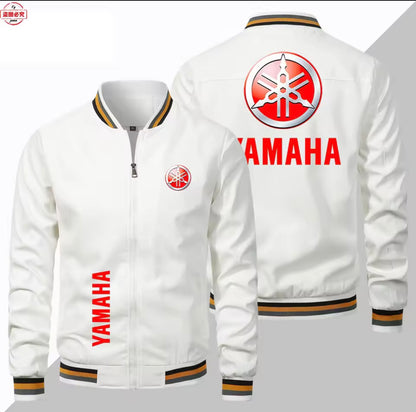 White Yamaha zip-up jacket shown from the front and back, featuring red Yamaha branding and gold and black striped ribbed trim on the collar, cuffs, and hem.