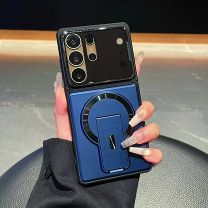 Blue phone case with a ring holder held by a hand on a blurred background