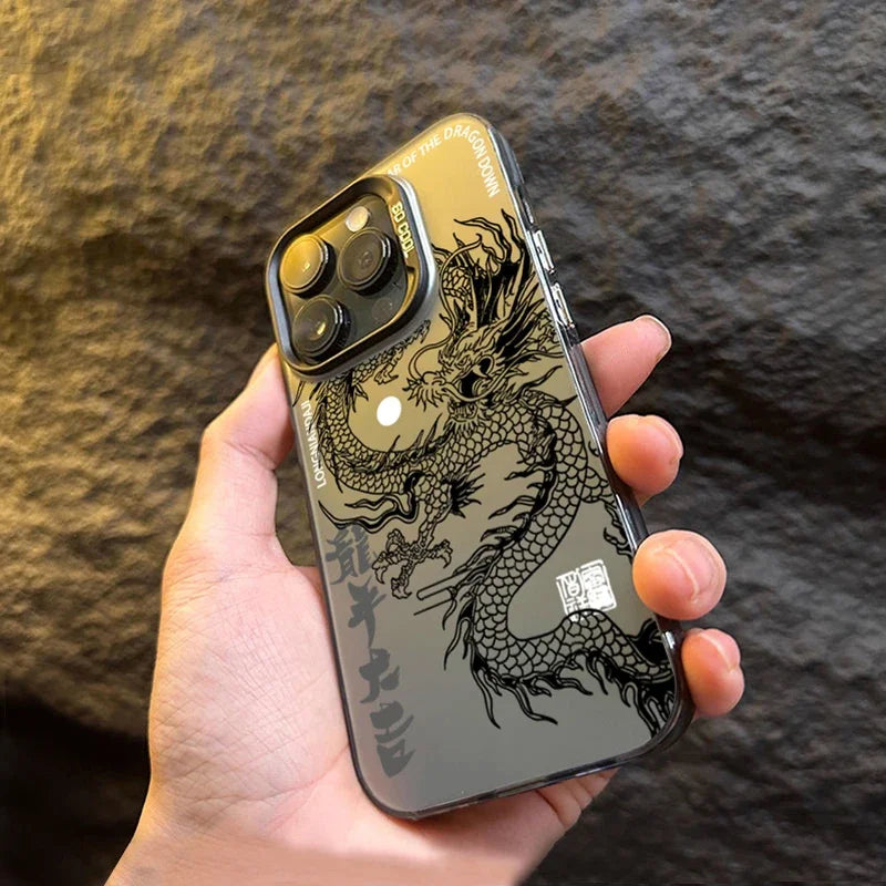 Phone case with dragon design held in a hand against a textured background