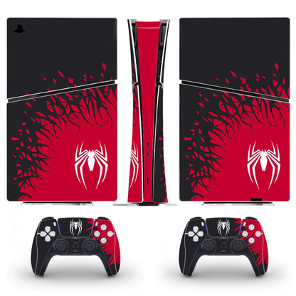 Gaming console and controller skin with red and black spider design on a white background