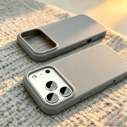 Two matte gray smartphone cases shown on a textured knit surface, with one case displaying the back and the other showing the side and camera cutout.