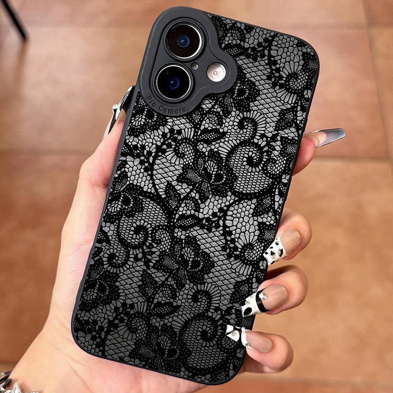 Black lace phone case held in a hand with a blurred background