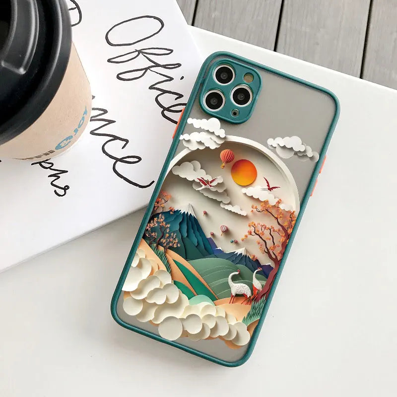 Phone case with nature design on a surface with a coffee cup and magazine.