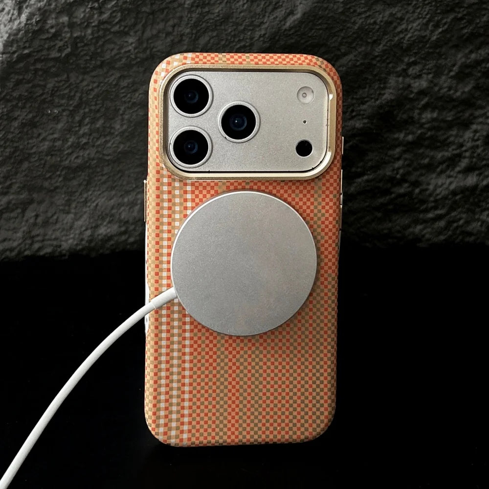 Phone case with a magnetic charging pad on a dark background