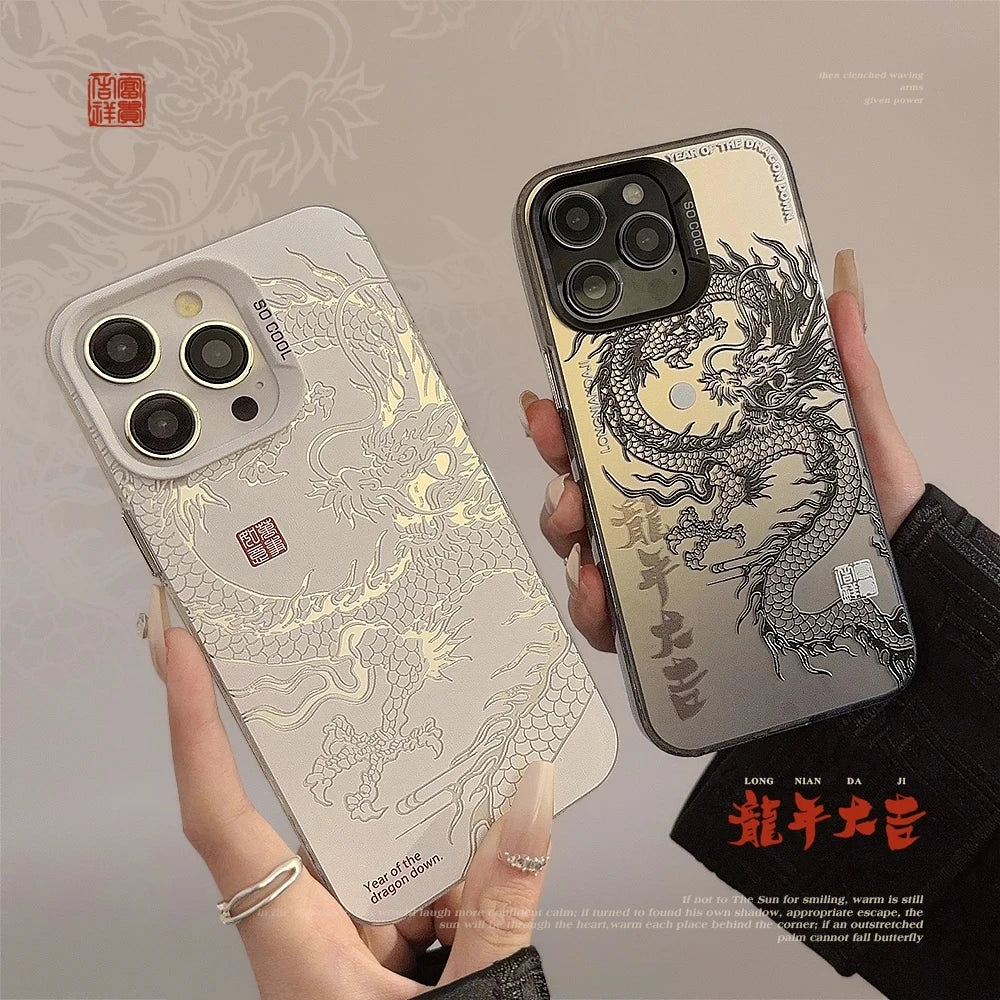 Phone cases with dragon design held by a person, featuring intricate patterns and text.