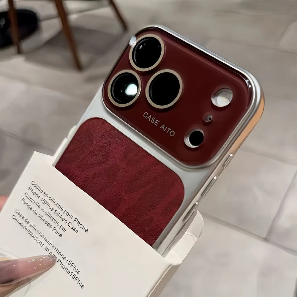 Phone case with 'CASE AITO' branding held by a hand on a tiled floor.