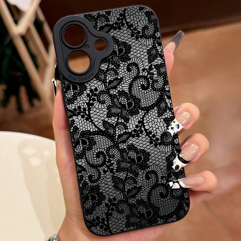 Black lace phone case held by a hand with a blurred background