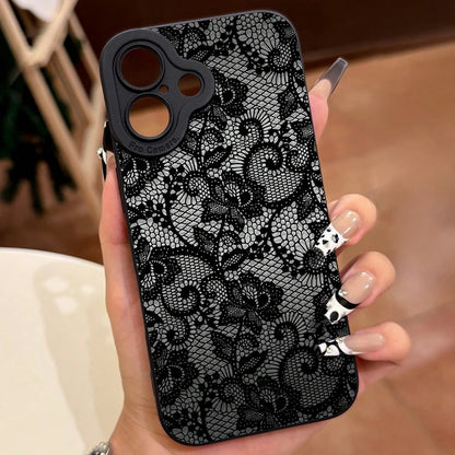 Black lace phone case held by a hand with a blurred background