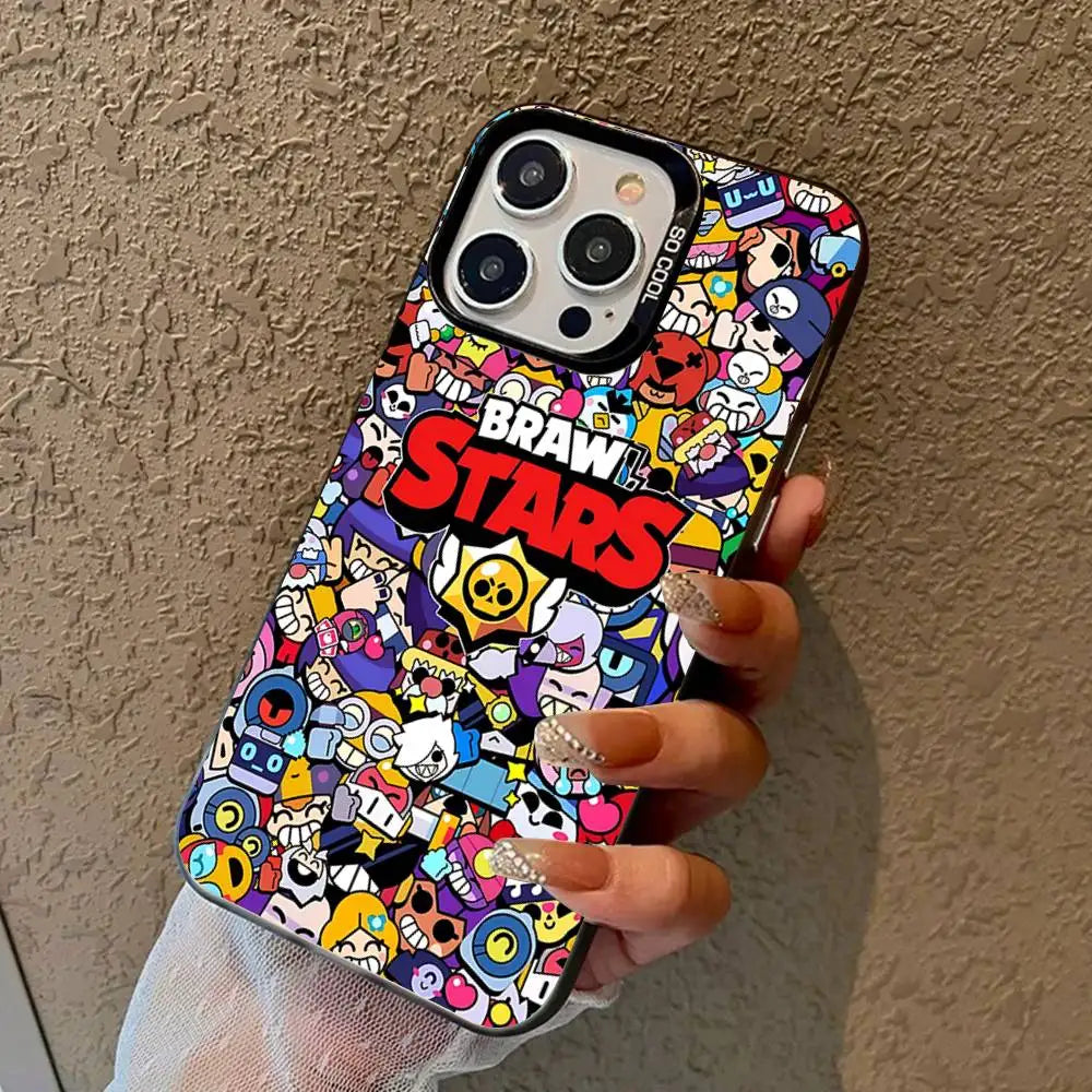 A hand holding a phone case featuring a colorful, dense cartoon collage with the prominent red and white 'BRAW STARS' logo. The background is a textured beige wall.