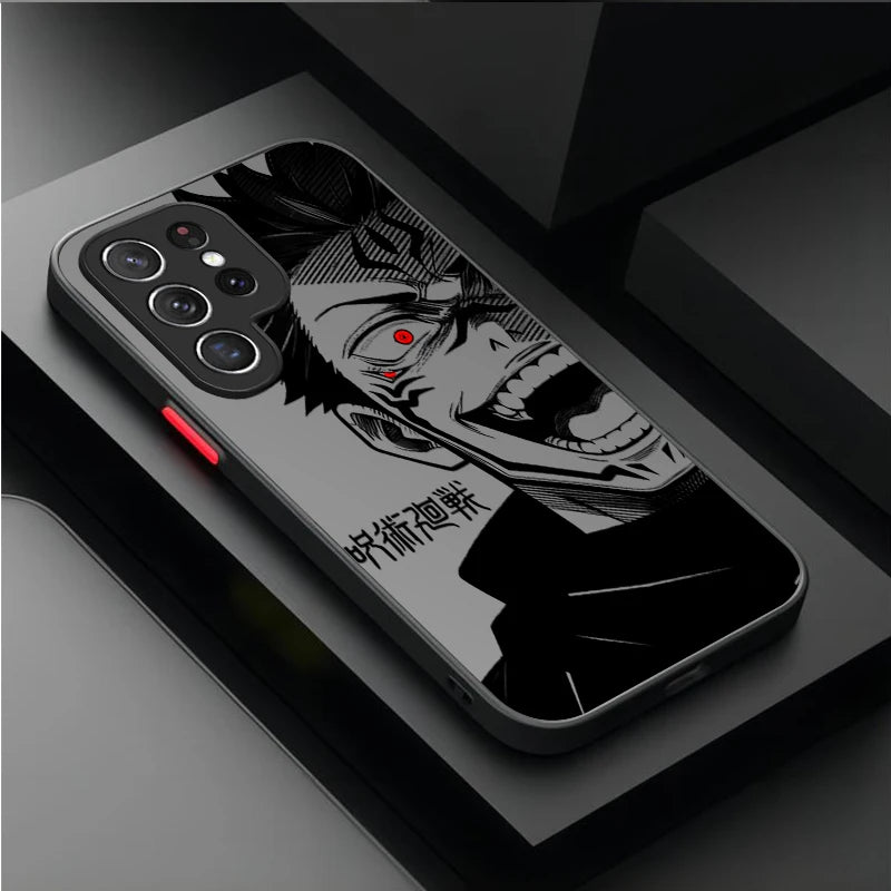 A black phone case featuring a bold black and white anime-style character illustration with a small red eye accent, shown on a dark gray smartphone. The case has a red accent button on the side and is photographed on a dark, modern geometric surface.