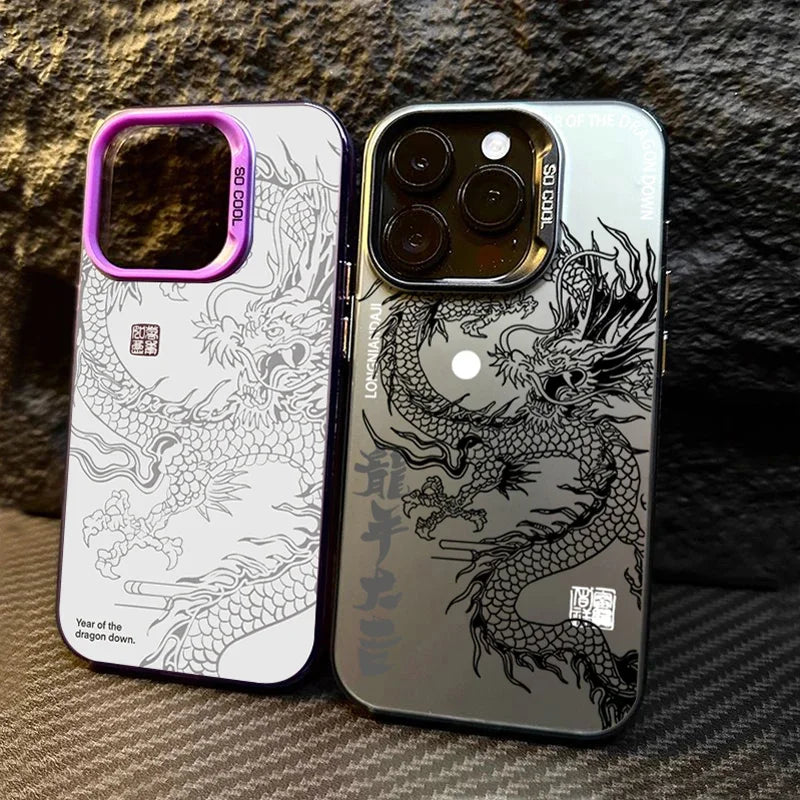 Two phone cases with dragon designs on a textured surface