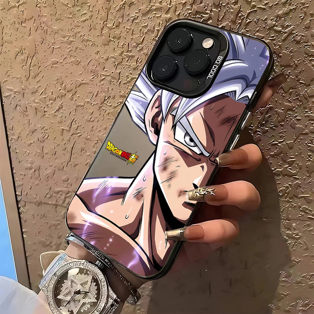 A hand holding a black phone case featuring an anime character print from Dragon Ball, with a visible Dragon Ball logo on the case. The hand has long manicured nails with gold rings, and the background is a textured brown wall.