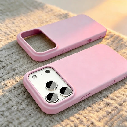 Two light pink phone cases shown on a textured beige knit surface, one empty and one fitted with a white smartphone.