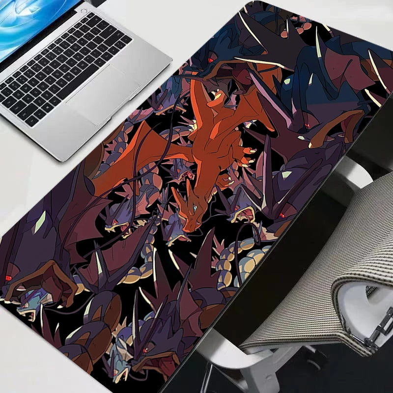 Desk setup with a colorful dragon design mouse pad, laptop, and chair.