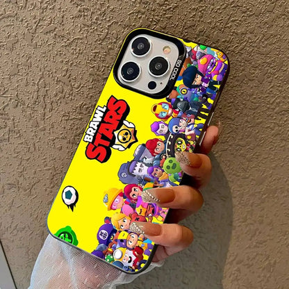 A hand holding a bright yellow Brawl Stars phone case decorated with colorful cartoon characters and the Brawl Stars logo, shown against a textured beige wall.